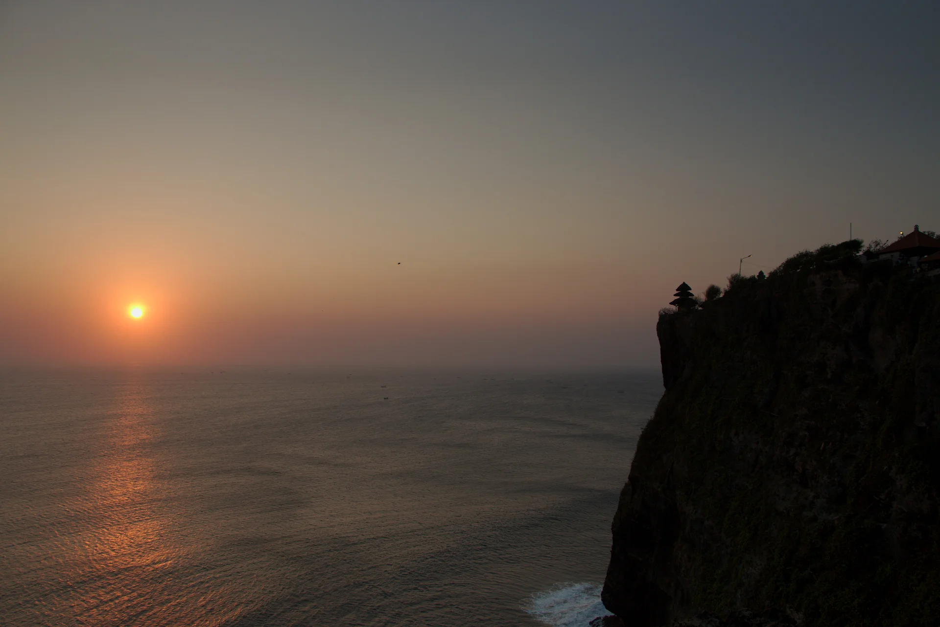 Sunset over Uluwatu cliffs in Bali