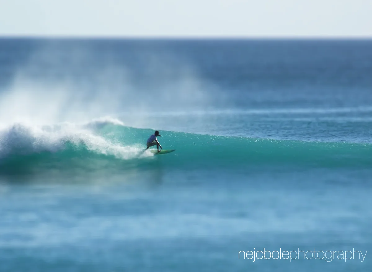 Surfing at Dreamland Beach, Bali